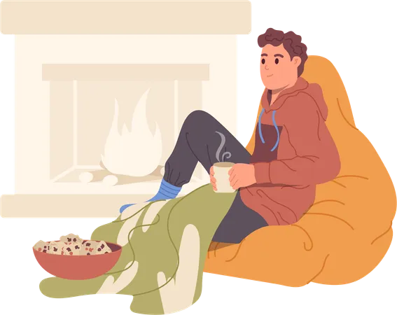 Hombre relajado bebiendo té caliente sentado en casa cerca de la chimenea  Ilustración