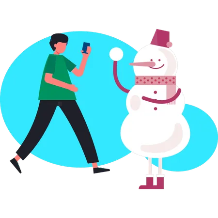 Un homme occupé à téléphoner tandis qu'un bonhomme de neige tient une boule de neige  Illustration