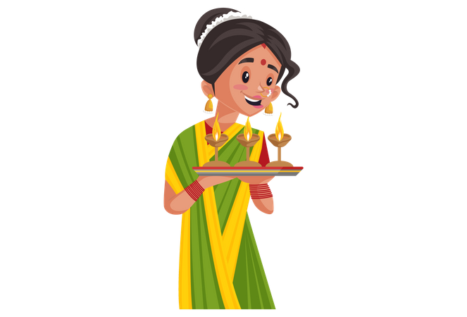 Indian Marathi woman is holding the Diyas plate in hand Illustration