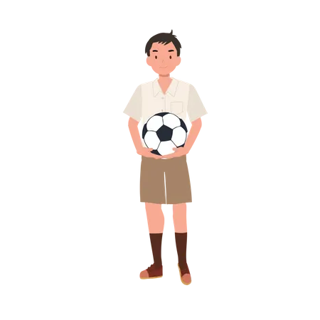 Jeune garçon étudiant thaïlandais tenant le football  Illustration