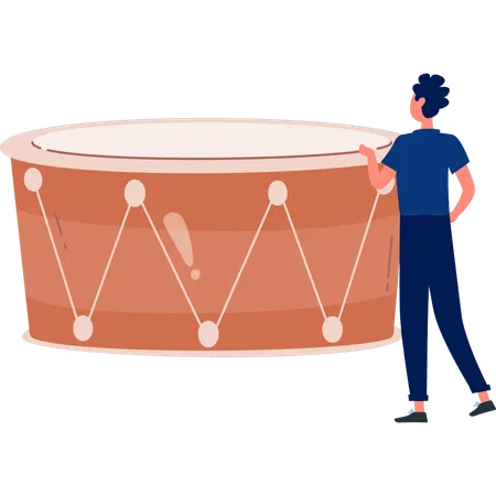 Junger Mann überprüft Bassdrum  Illustration