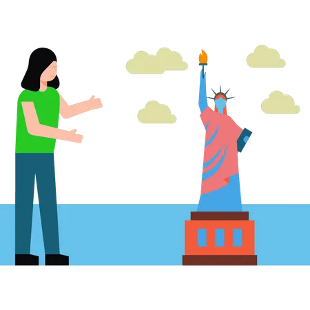 La niña muestra la Estatua de la Libertad.  Ilustración