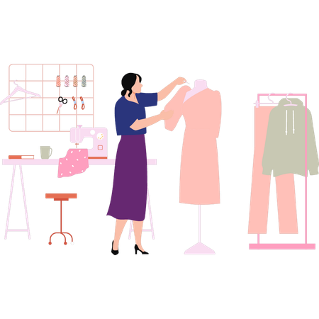 Le créateur de mode conçoit les vêtements  Illustration