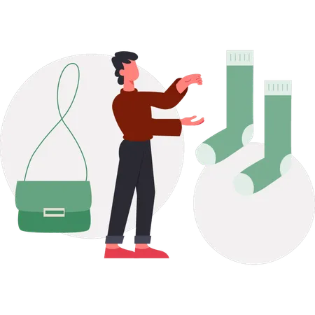Le garçon montre des chaussettes d'hiver  Illustration