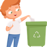 a boy throwing garbage in dustbin