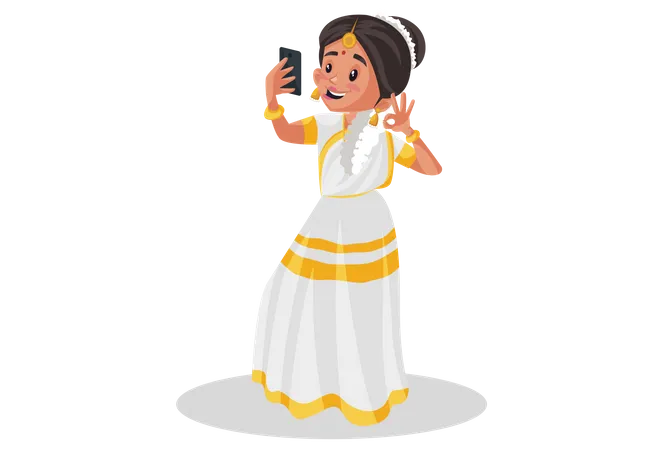 Malayali woman is taking selfie in the mobile phone  Illustration