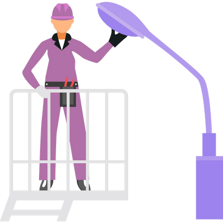 Male electrician fixing street light  イラスト
