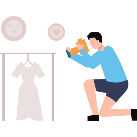 Male photographer taking photo of dress  일러스트레이션