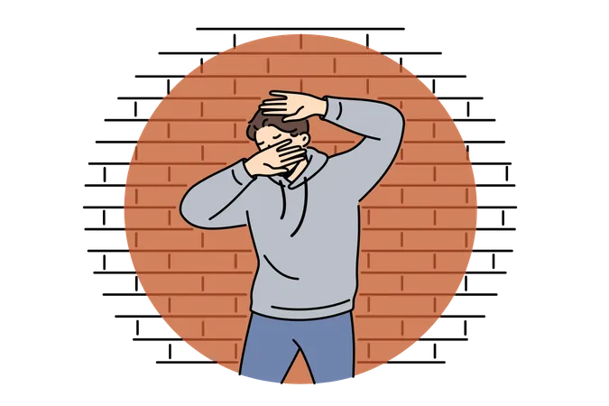 Man criminal in light of police lantern stands near brick wall and covers face with hands  イラスト