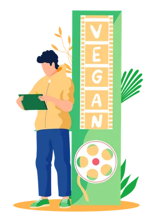 A Man Stands With A Tablet In His Hands And Works Or Studies Against The Background Of An Inscription About Veganism And An Image Of A Film Strip Healthy Lifestyle Organic Natural Food And Drink Illustration