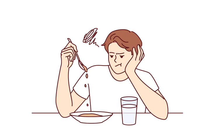 Man Suffers From Lack Of Appetite Sitting At Table In Kitchen And Does Not Want To Eat Breakfast Depressed Guy With Unhappy Expression Melancholy Looks At Plate With Not Appetite Food During Diet Illustration