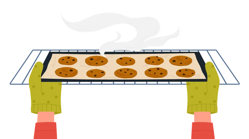 Manos con guantes sacando la bandeja de galletas del horno  Ilustración