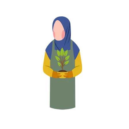 Muslim woman hold plant Illustration