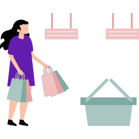 La chica lleva bolsas de compras.  Ilustración