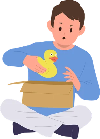 Niño sorprendido que lleva un patito de goma de juguete después de desembalar una caja de cartón  Ilustración