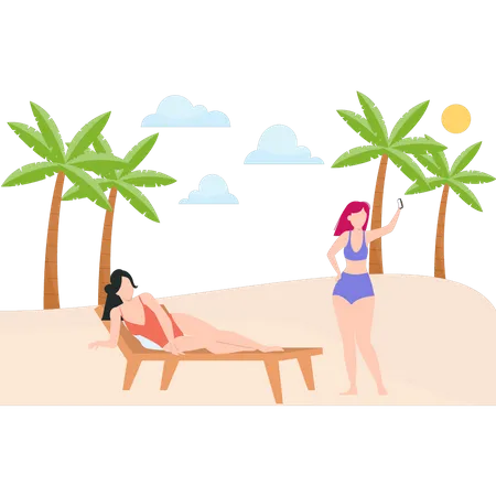 One girl taking selfie and other one relaxing on beach  Illustration