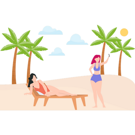 One girl taking selfie and other one relaxing on beach  Illustration