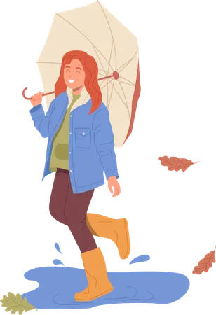 Petite écolière heureuse en vêtements chauds avec parapluie marchant dans la rue sous la pluie  Illustration