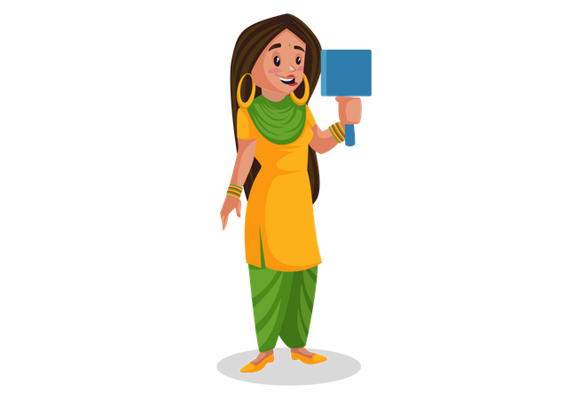 Punjabi girl watching herself in the mirror  Illustration