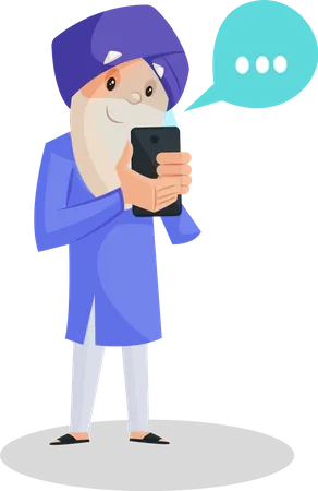Vieil homme punjabi discutant sur un téléphone portable  Illustration