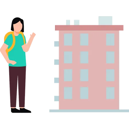 Student standing outside the school building  Illustration