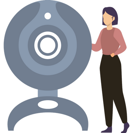 The girl is standing near the webcam  Illustration