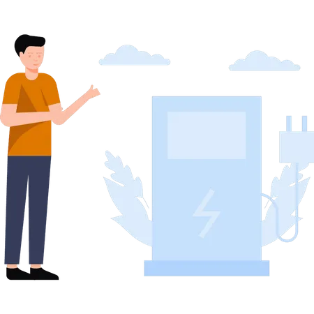 Le garçon se tient à côté d’une station-service écologique  Illustration