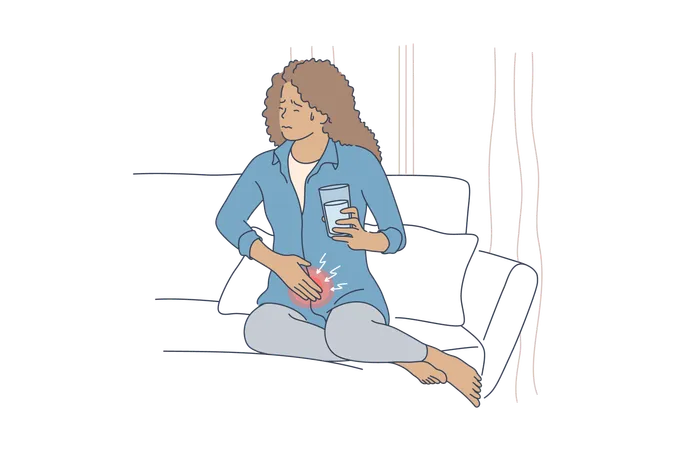 Woman frowning in ibd pain sitting on couch covering stomach holding glass of water  Illustration