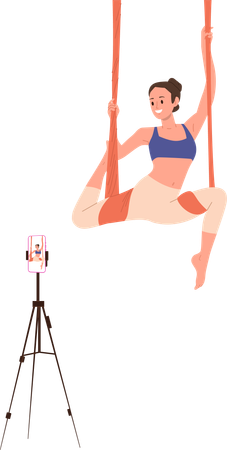 Young sportswoman doing aerial yoga recording video tutorial for blog on phone  Illustration